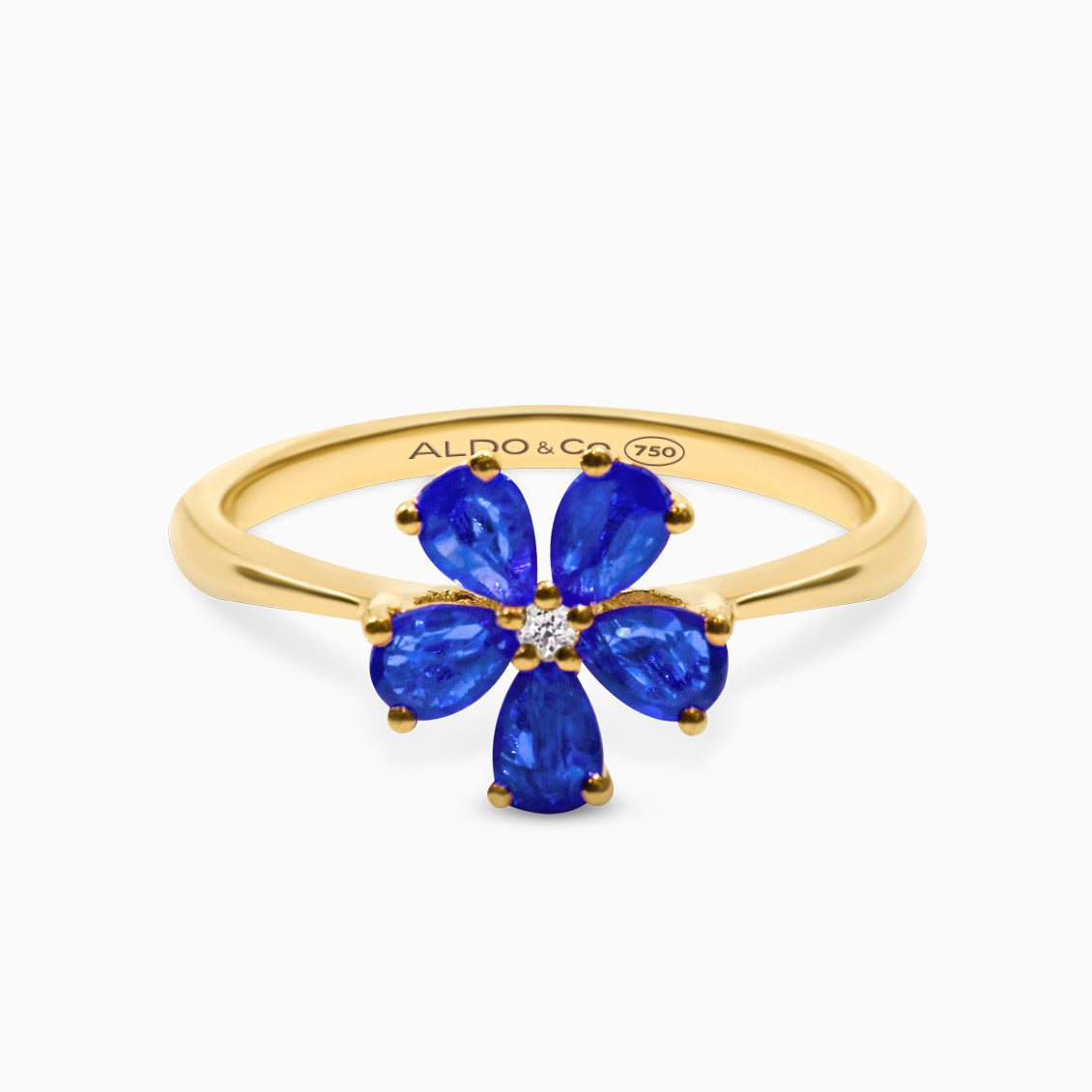 Anillo roseta en oro amarillo de 18K con zafiros