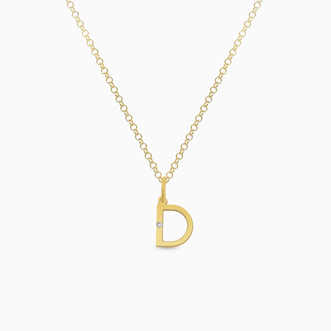 Dije en oro amarillo de 18K letra D moderna con brillante