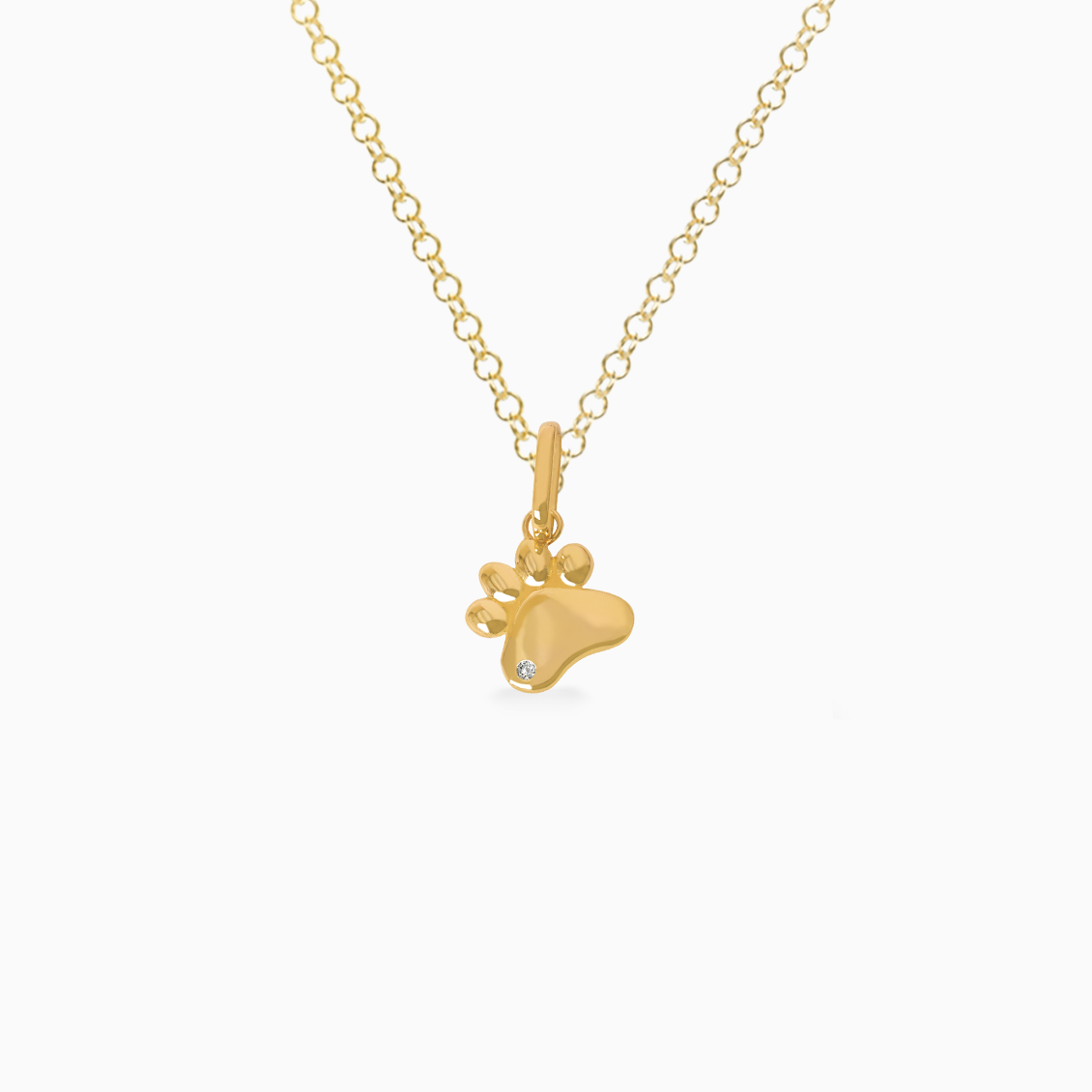 Dije en oro amarillo de 18K huellita con brillante