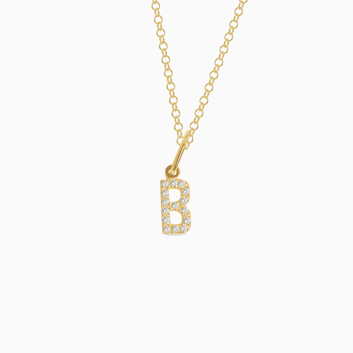 Dije en oro amarillo de 18K letra B full brillantes