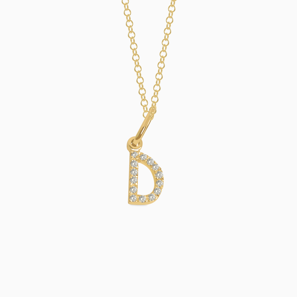 Dije en oro amarillo de 18K letra D full brillantes