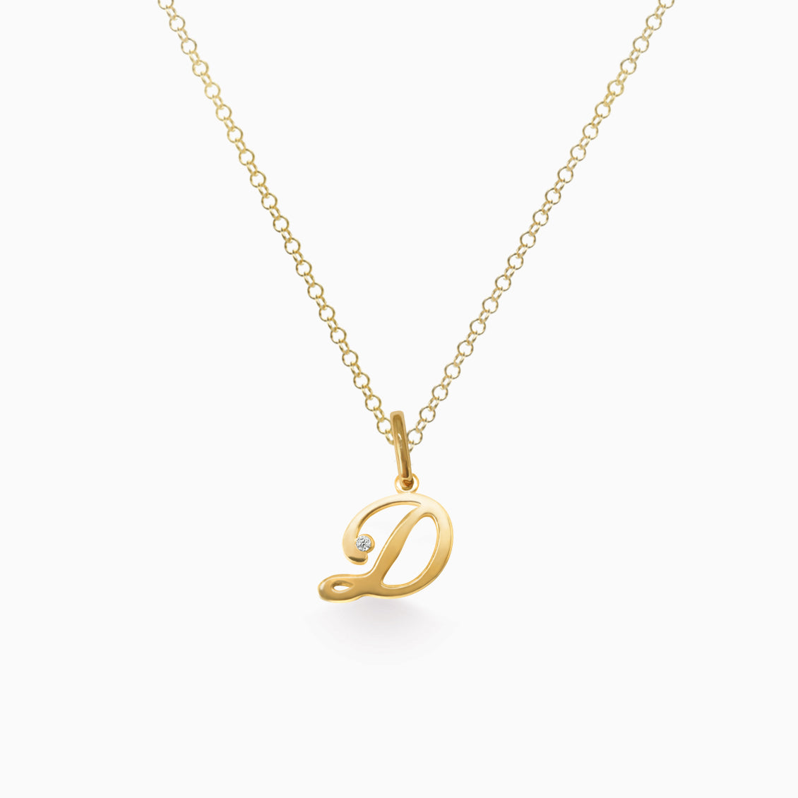 Dije en oro amarillo de 18K letra D