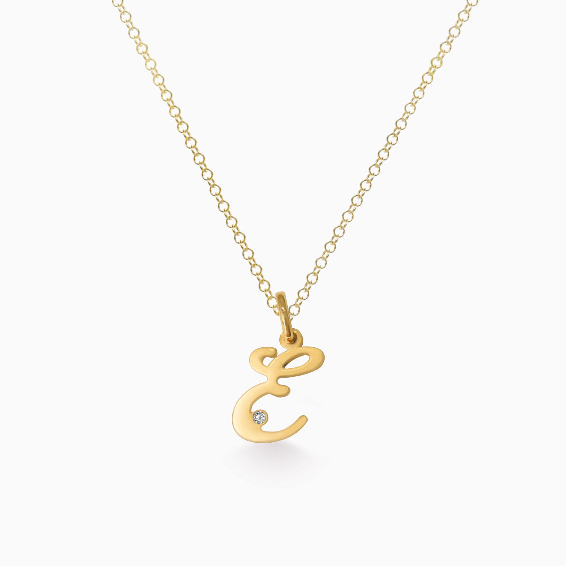 Dije en oro amarillo de 18K letra E