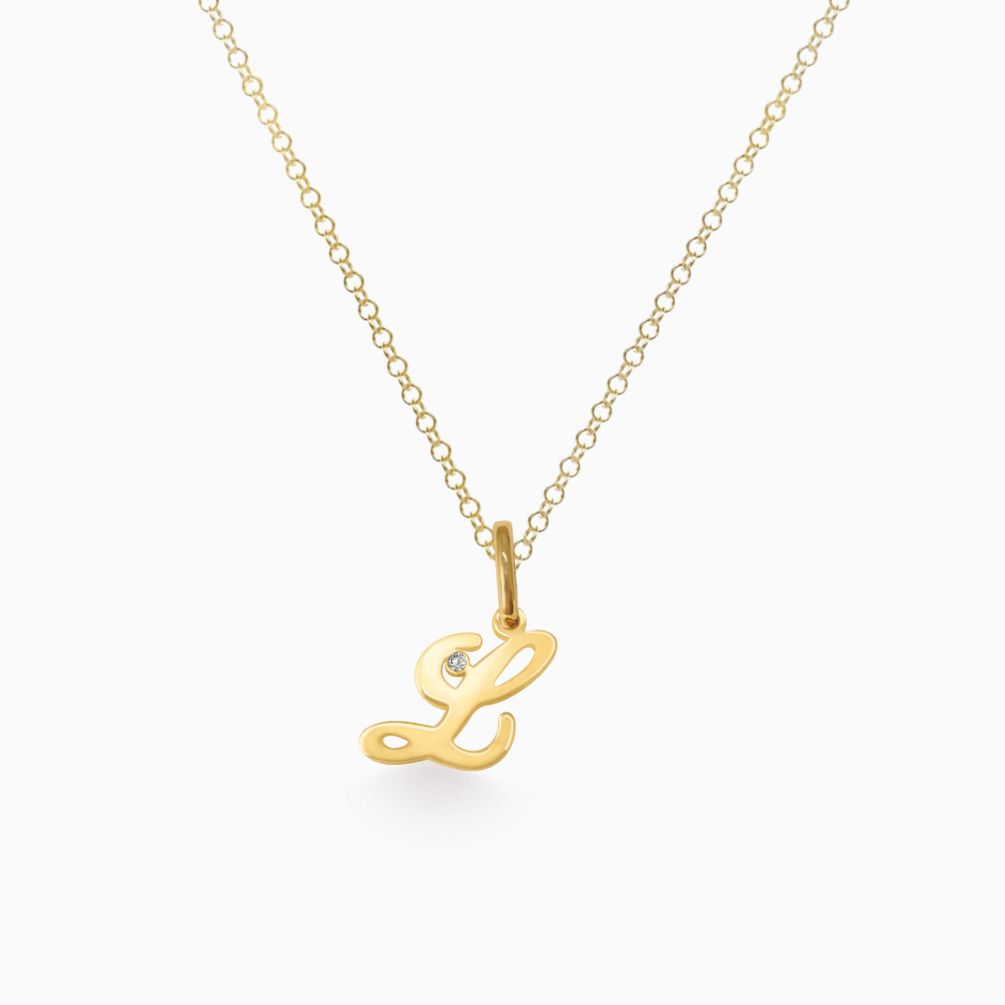 Dije en oro amarillo de 18K letra L