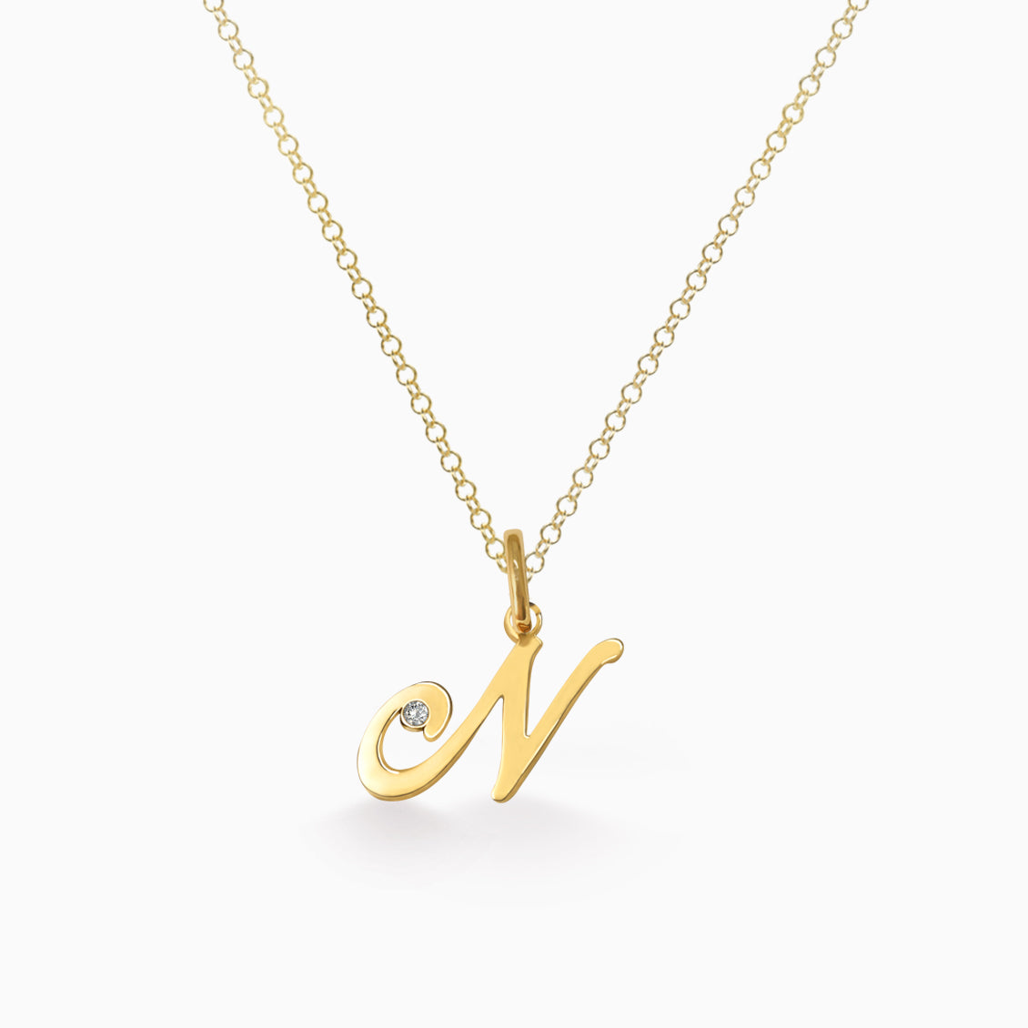 Dije en oro amarillo de 18K letra N