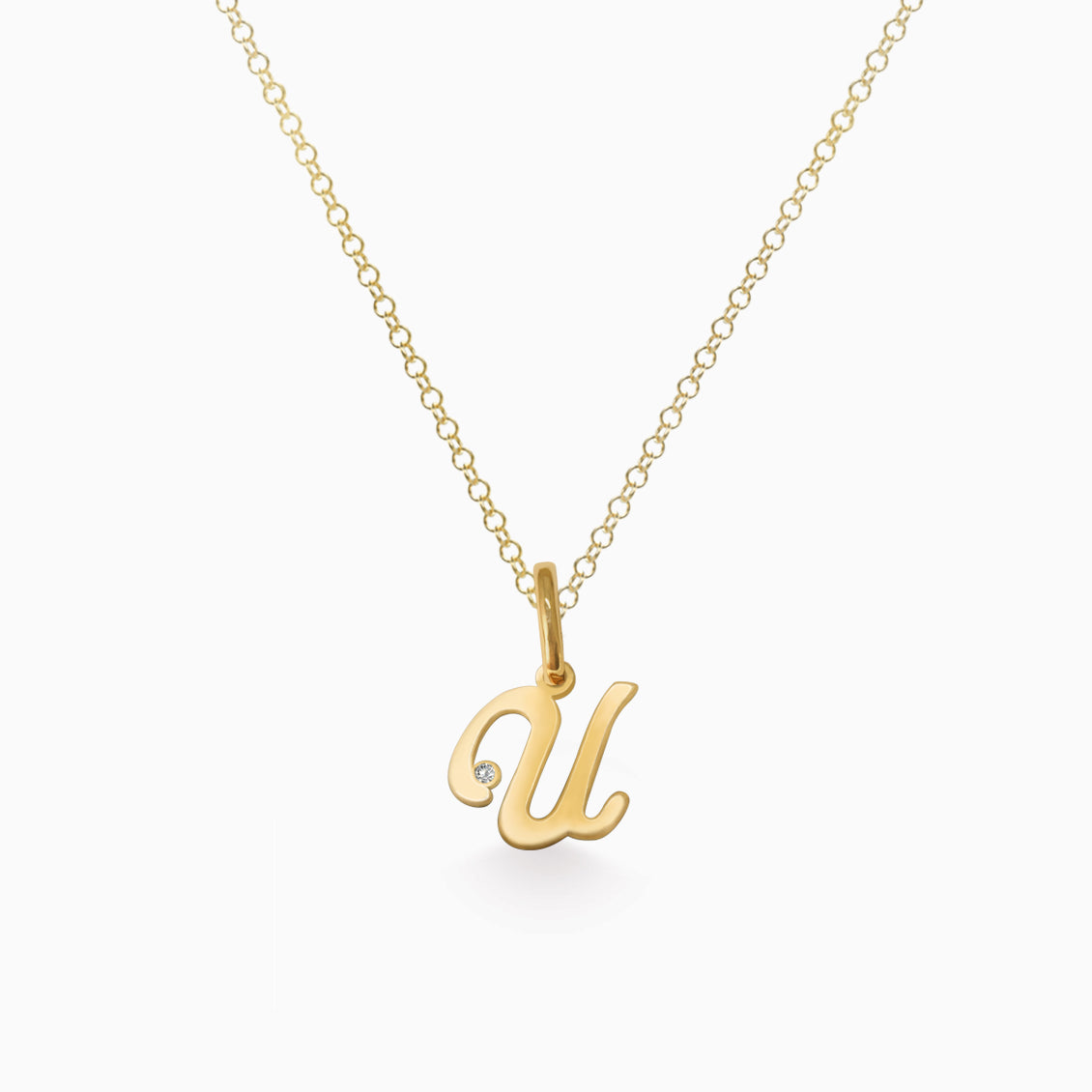 Dije en oro amarillo de 18K letra U