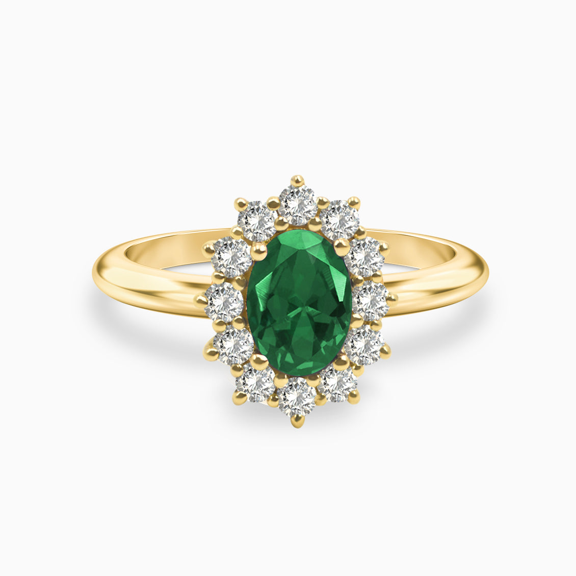 Anillo en oro amarillo de 18K con esmeralda oval y brillantes